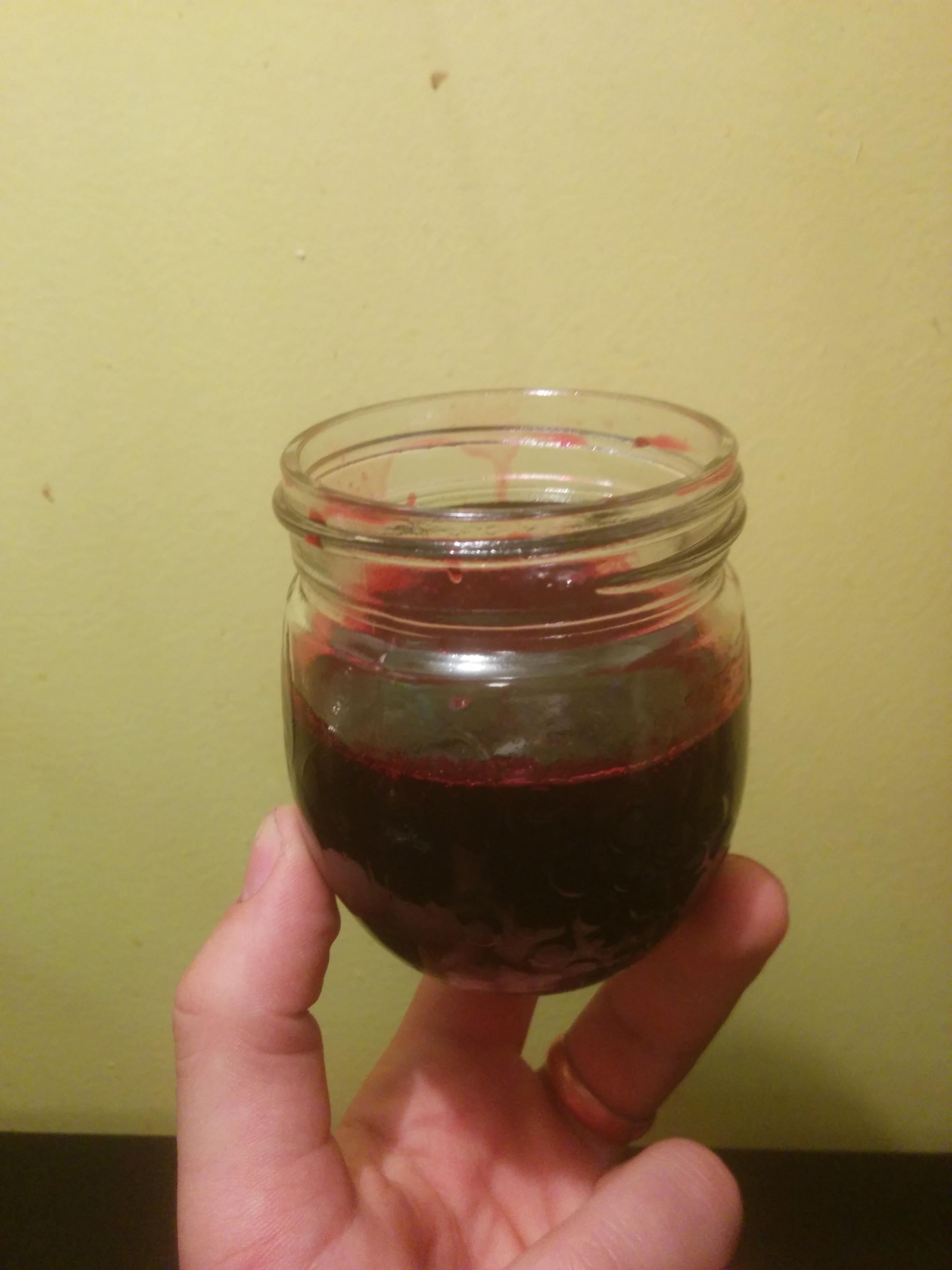 A small jar of elderberry syrup I made