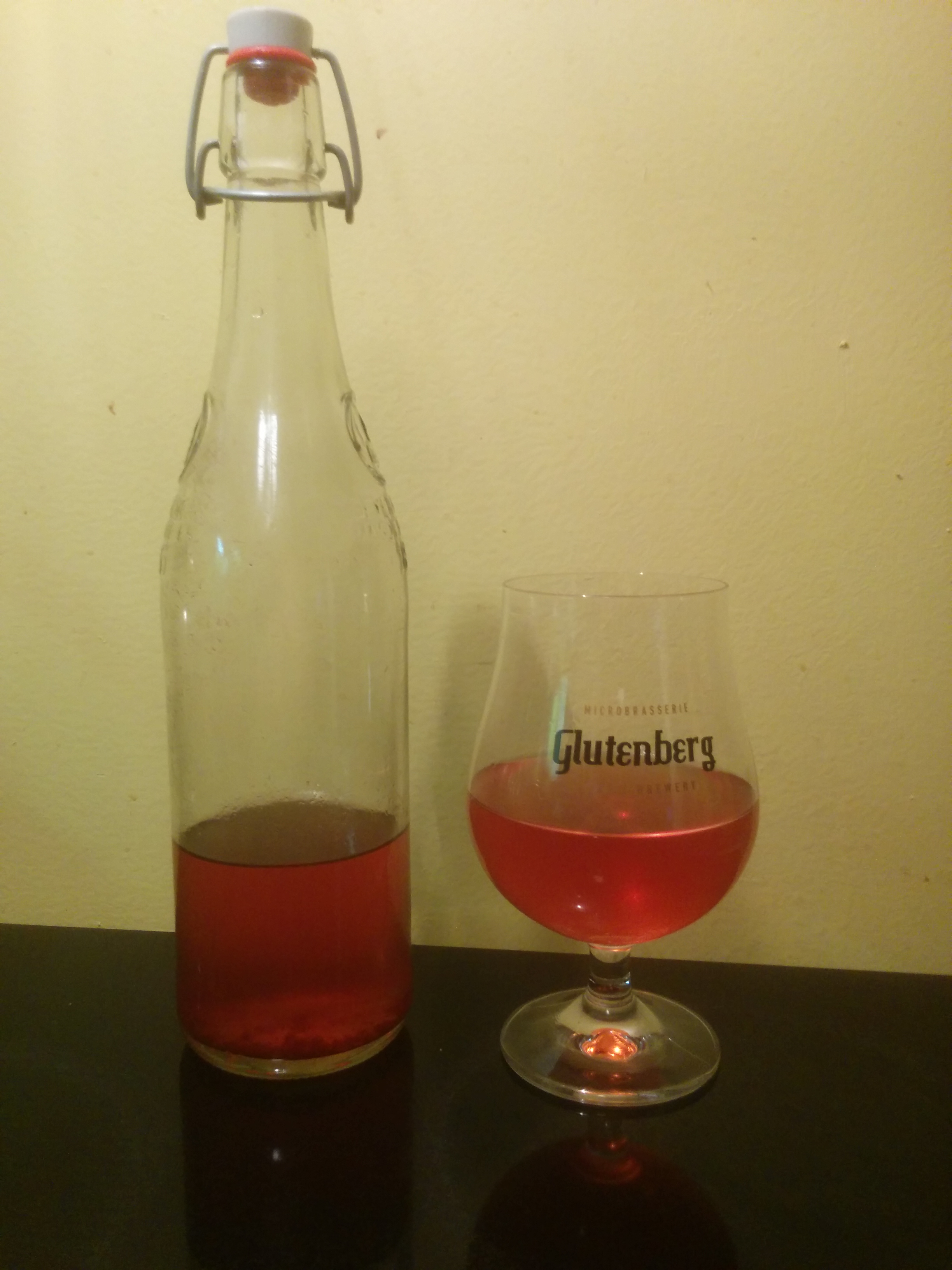 A bottle of homemade pink lemonade