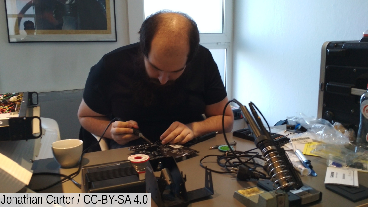 Nicolas soldering a USB port