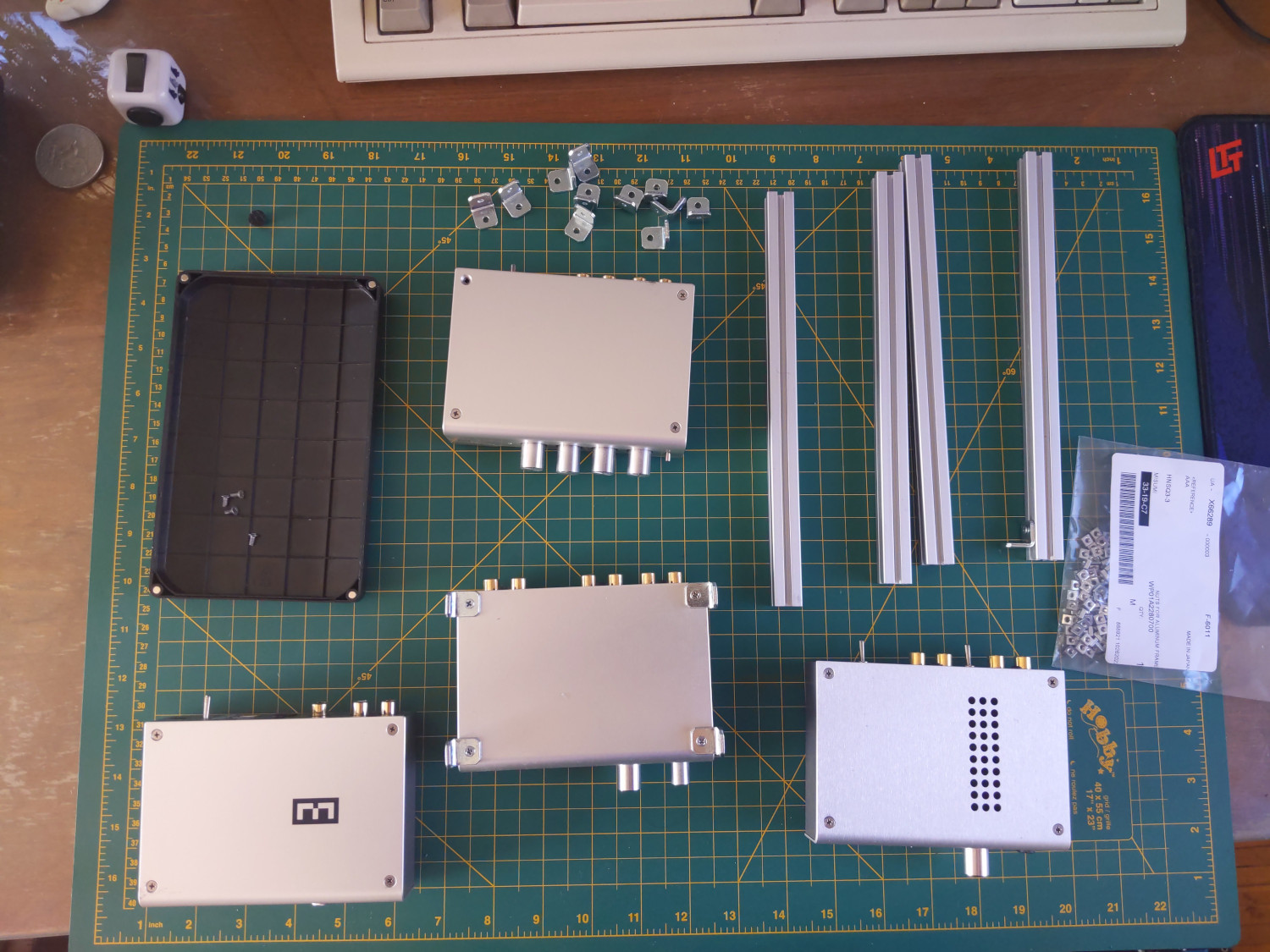 The 4 different Schiit devices with the hardware needed to build the extruded frame