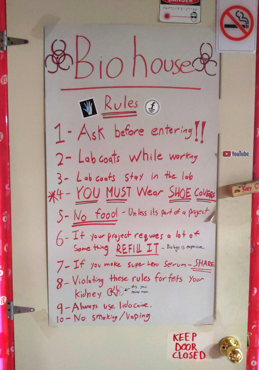 The entrance of the bio-hacking house, with a list of rules